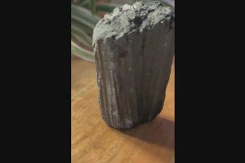 Raw black tourmaline crystal video showing natural texture and form