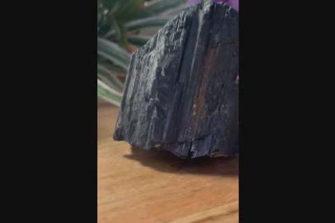 Raw black tourmaline crystal video showing natural texture and form
