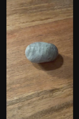 Labradorite tumbled crystal video showing magical iridescent flash and color play