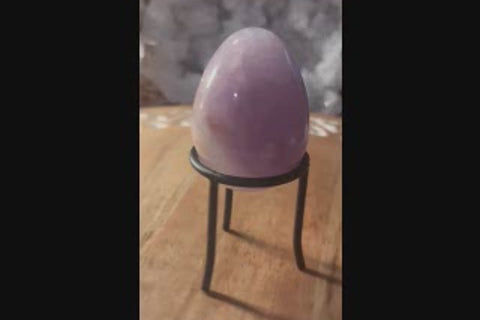 Amethyst crystal egg video showing natural purple color and smooth polished surface
