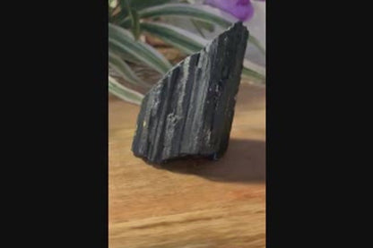 Raw black tourmaline crystal video showing natural texture and form