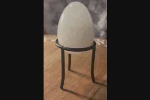 White quartz crystal egg video showing milky translucent appearance and smooth finish